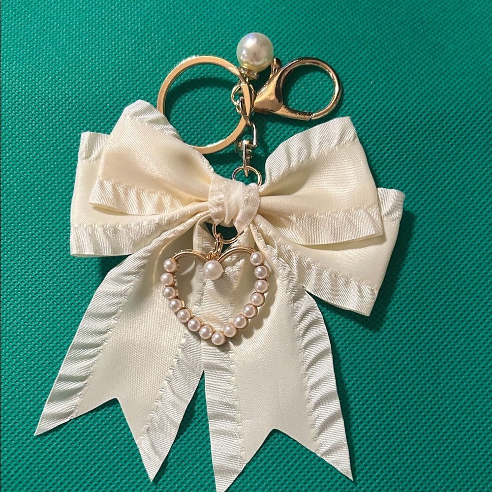 Elegant Cream Bow Keychain with Pearl Heart Charm